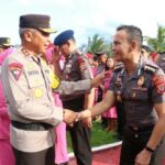 Upacara laporan kenaikan pangkat digelar di Mapolda Sulut, Minggu (31/12/2023) sore, dipimpin Kapolda Sulut Irjen Pol Setyo Budiyanto.