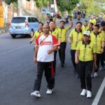 Panitia Hari Bakti Adhyaksa Ke-64 Tahun 2024 Kejaksaan Tinggi Sulawesi Utara menggelar Kegiatan Jalan Sehat Bersama, Jumat (19/7/2024).