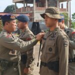 Kapolda Sulawesi Utara Irjen Pol Yudhiawan menutup pelatihan kemampuan Brimob dan tradisi pembaretan Bintara dan Tamtama Remaja tahun 2024, di Mako Brimob Batalyon C Pelopor, Sat Brimob Polda Sulut, Rabu (18/9/2024).