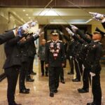 Diiringi Pedang Pora, Insan Pengayoman Sulut Lepas Kepergian Ronald Lumbuun