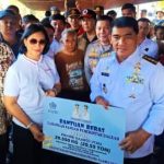 Sekretaris Daerah Kabupaten Minahasa, Dr. Lynda D. Watania, MM, M.Si, mendampingi Gubernur Sulawesi Utara