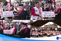 Bupati Minahasa Dr. Robby Dondokambey, SSi, MAP dan Wakil Bupati Vanda Sarundajang, SS menyerahkan Bonus kepada para Atlit Peraih Medali dan para Pelatih serta Pelatih Berprestasi dalam ajang Pekan Olahraga Provinsi (PORPROV) XII Sulawesi Utara 2025