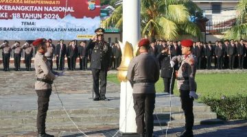 Wakapolda Sulawesi Utara Awi Setiyono bertindak sebagai inspektur upacara dalam peringatan Hari Kebangkitan Nasional (Harkitnas) ke-118 tahun 2026 di Lapangan Presisi Polda Sulut, Rabu (20/5/2026).