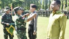 Panglima Kodam XIII/Merdeka Mayjen TNI Mirza Agus memimpin upacara penutupan TMMD ke-128 Tahun Anggaran 2026 di Lapangan Alun-Alun Desa Limbato, Kecamatan Tilamuta, Kabupaten Boalemo, Kamis (21/5/2026).