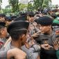 Pengamat politik Boni Hargens menilai pendekatan humanis yang diterapkan Polri dalam mengawal berbagai aksi unjuk rasa sepanjang Juni 2026.