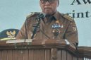 Bupati Minahasa Dr. Robby Dondokambey.