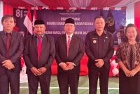 Foto Dok: Asisten I Pemerintahan dan Kesejahteraan Rakyat Kabupaten Minahasa, Drs. Riviva Maringka, M.Si. (tengah) 