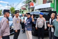 Polresta Manado menyalurkan bantuan kebutuhan pokok dan membuka layanan pemeriksaan kesehatan gratis bagi warga terdampak kebakaran di Kelurahan Sindulang Satu, Lingkungan I, Kecamatan Tuminting, Rabu (14/10/2026).